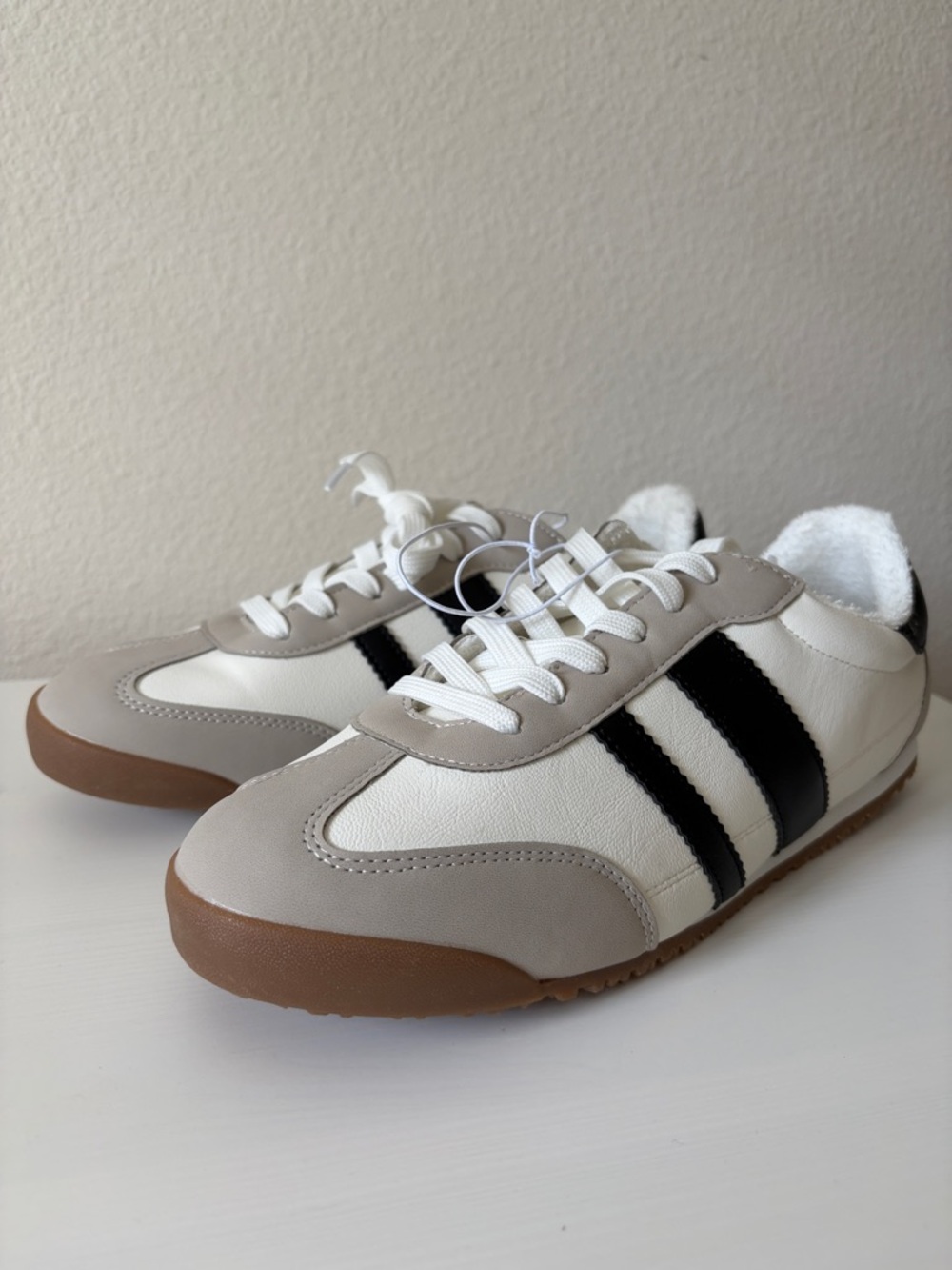 Dolce Vita White Sneakers with Black Stripes and Beige Accents